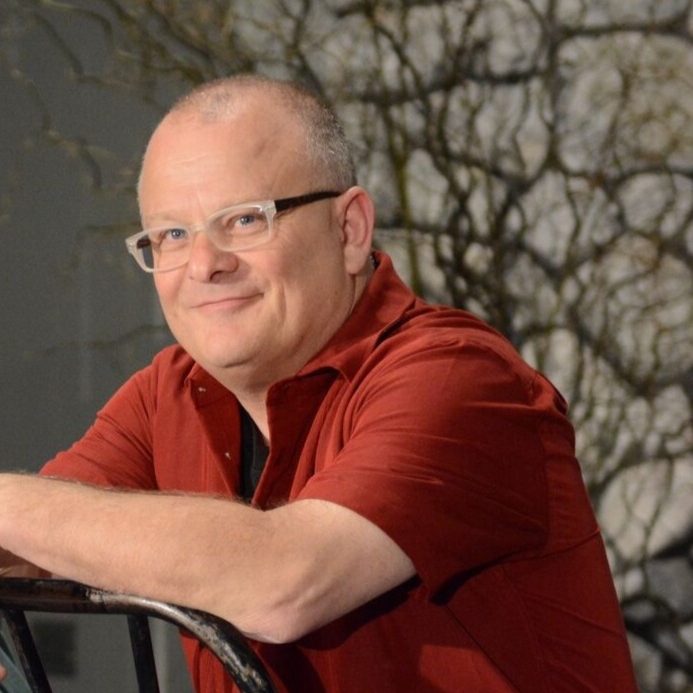 Jeff smiling red shirt